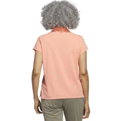 Adidas 2023 Women's Go-To Heathered Polo -Pum Golf Club Shop adidas 23 womens go to heathered polo coral fusion back itempicture