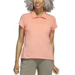 Adidas 2023 Women's Go-To Heathered Polo -Pum Golf Club Shop adidas 23 womens go to heathered polo coral fusion itempicture