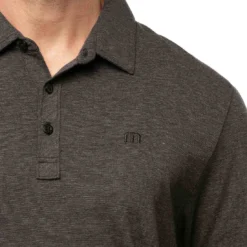 TravisMathew The Zinna Polo -Pum Golf Club Shop travismathew 2023 the zinna polo black logo itempicture